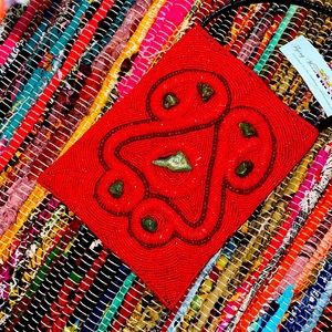 Red handmade beaded bag